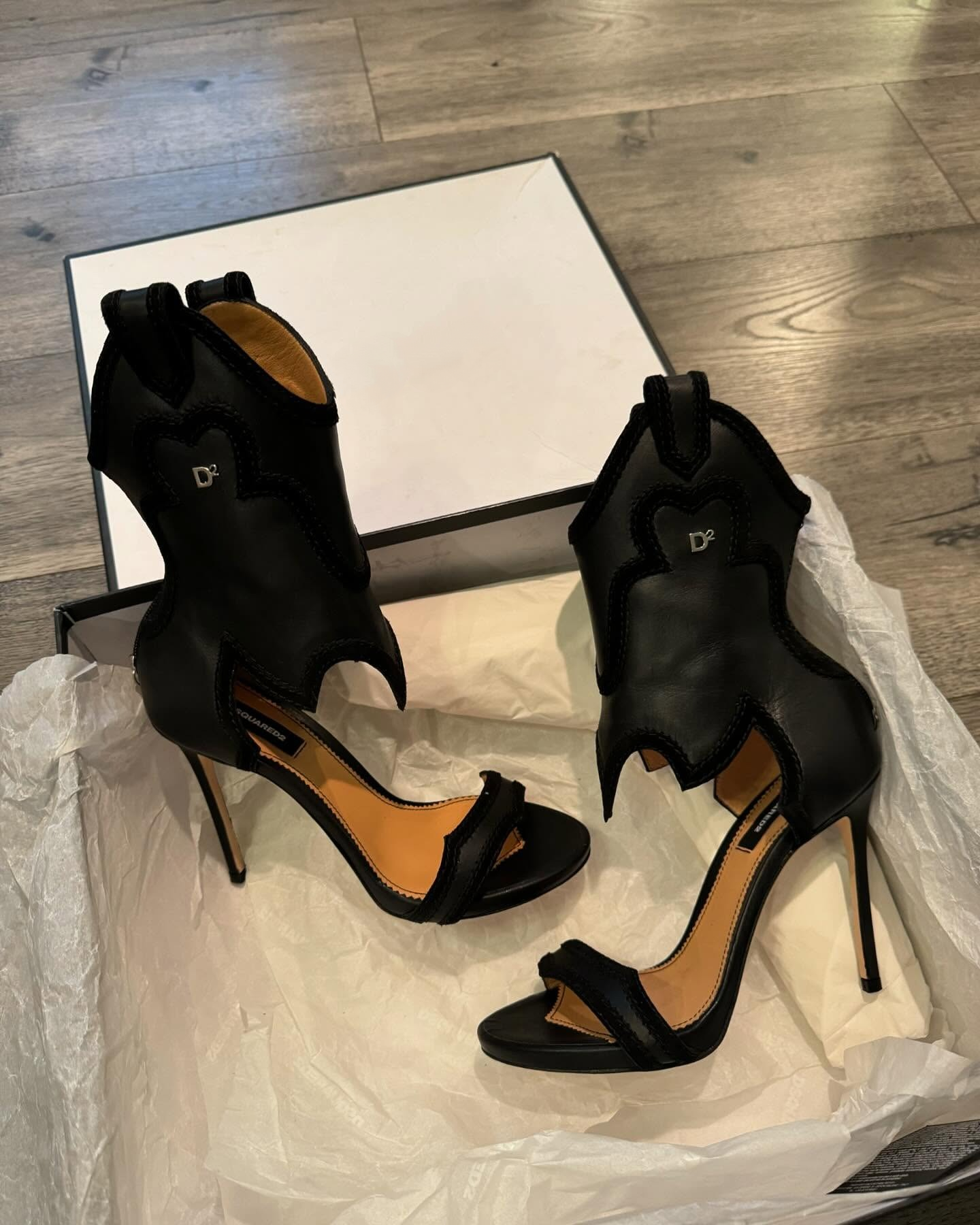 Black unique high heel sandals