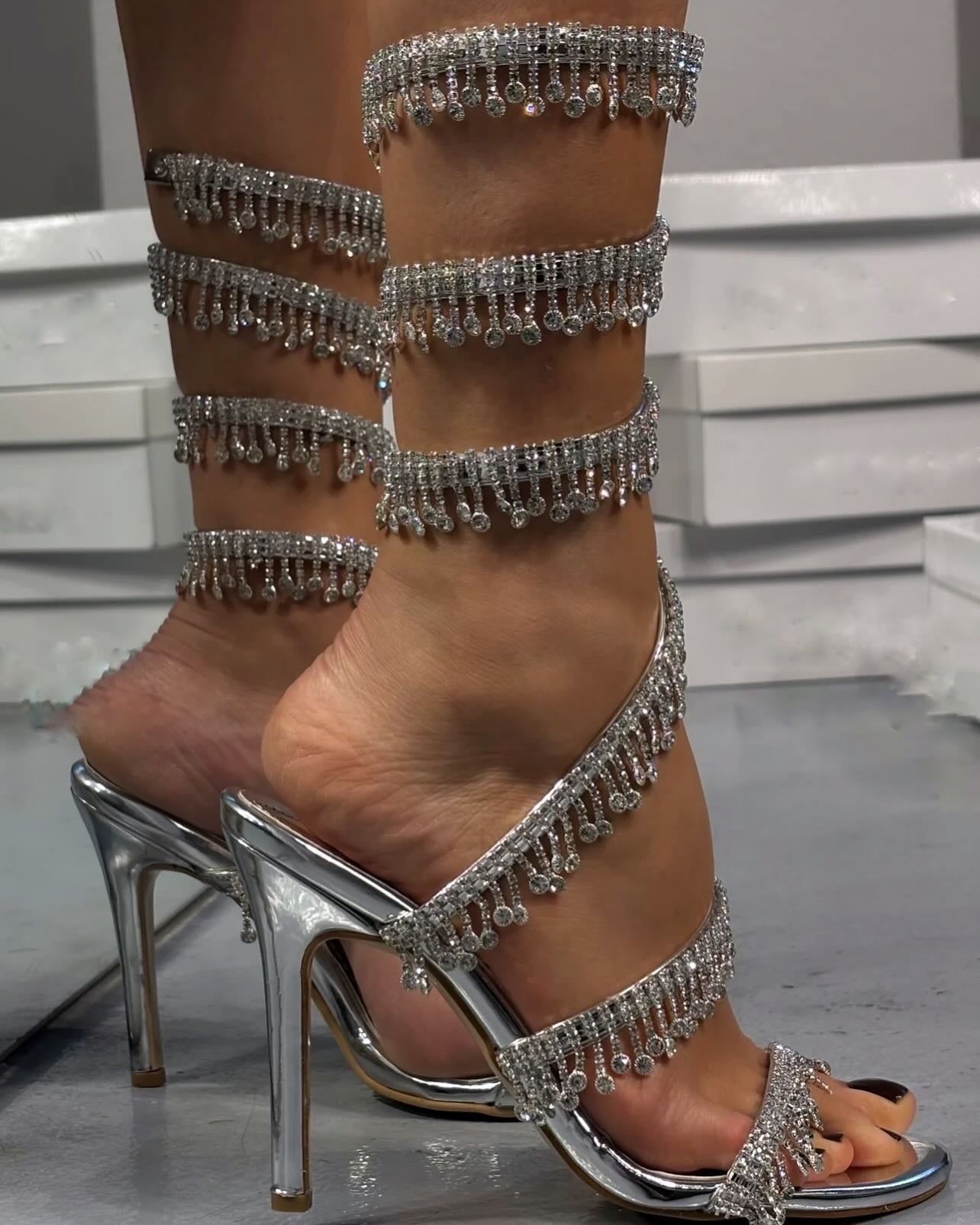 Silver tassel high heels