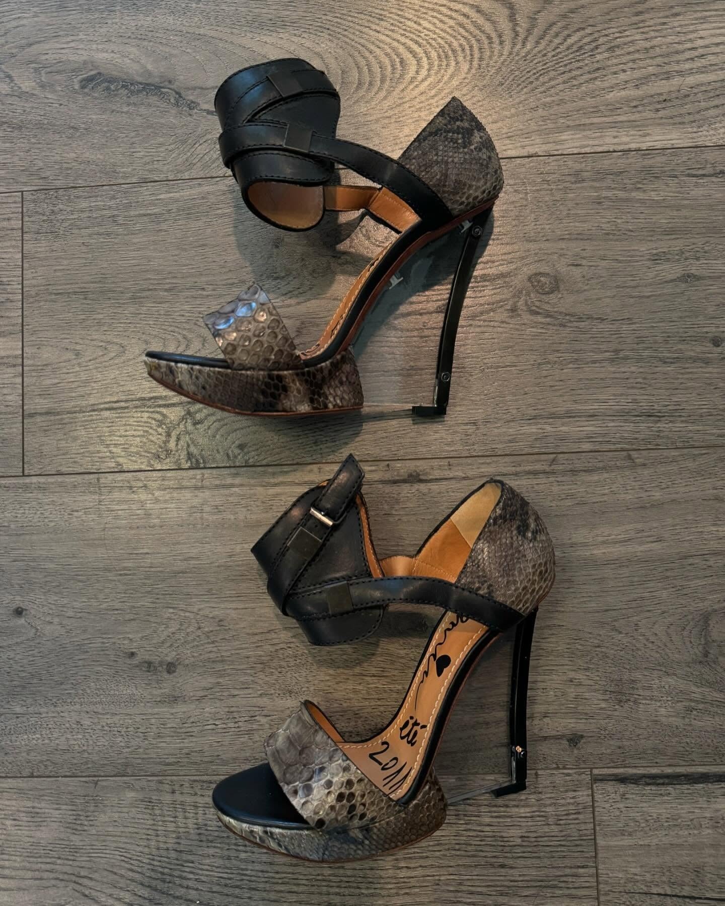 Runway snakeskin wedge heels