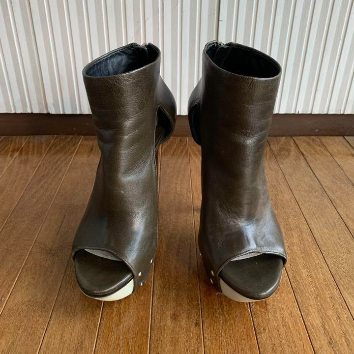 Green unique leather high heels