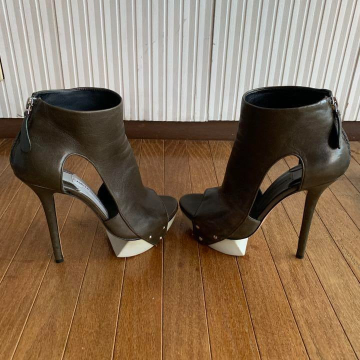 Green unique leather high heels