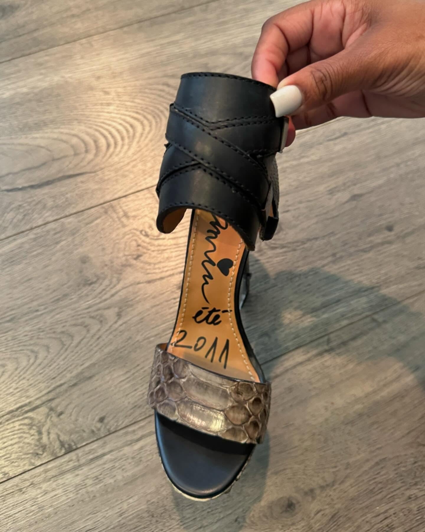 Runway snakeskin wedge heels