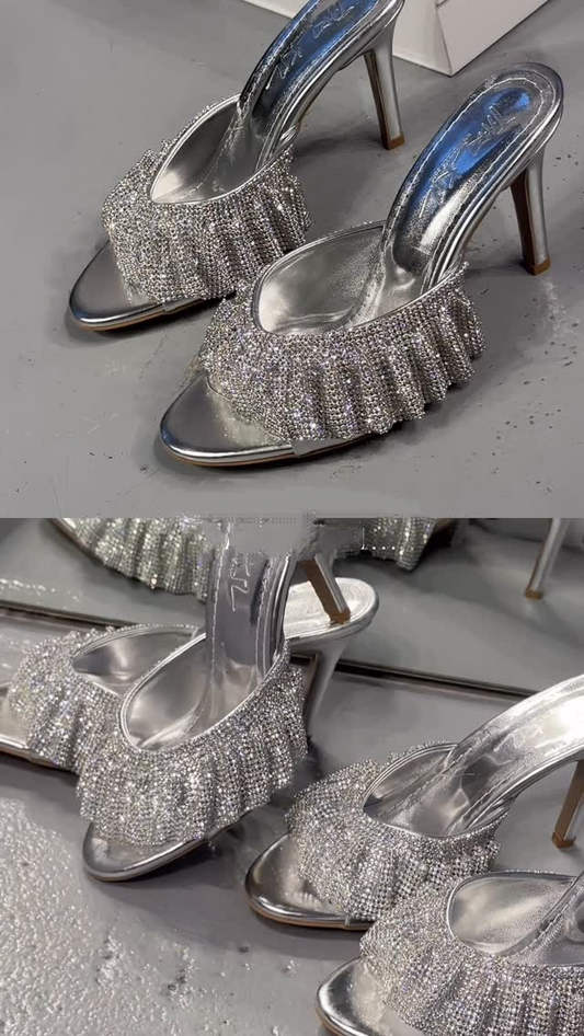 Shiny silver high heels