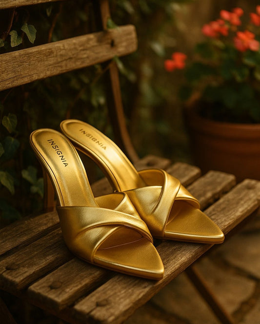Gold stiletto high heels