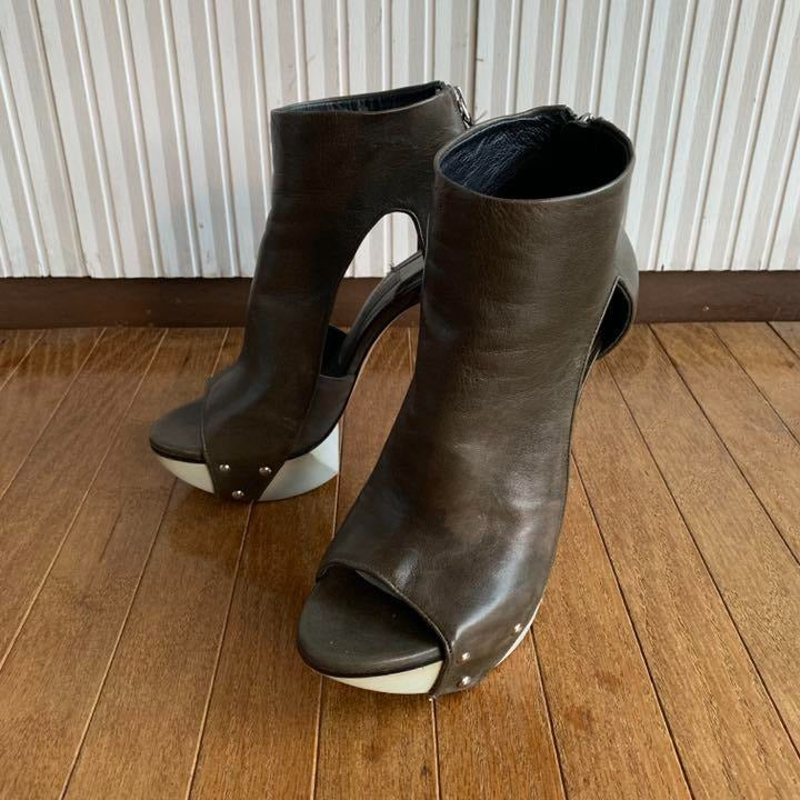 Green unique leather high heels