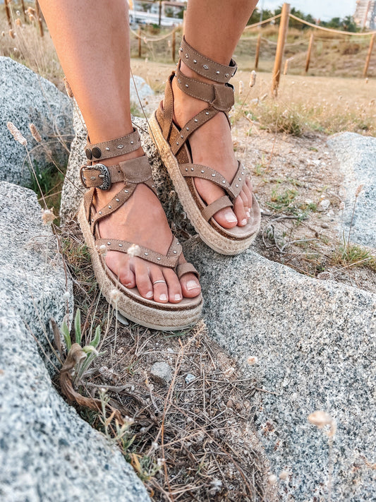 Thick-soled studded sandals