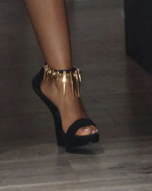 Cone-shaped embellished high heels