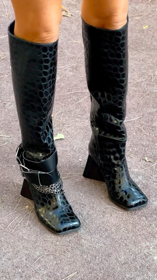 Stylish black high-heeled boots