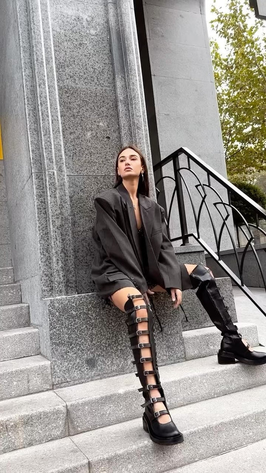 Hollow black boots